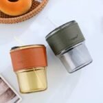⁦كوب زجاجي مع مقبض جلد⁩ - الصورة ⁦2⁩